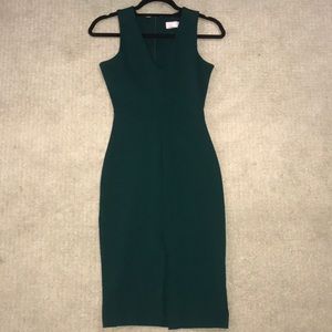 Emerald green bodycon midi dress.